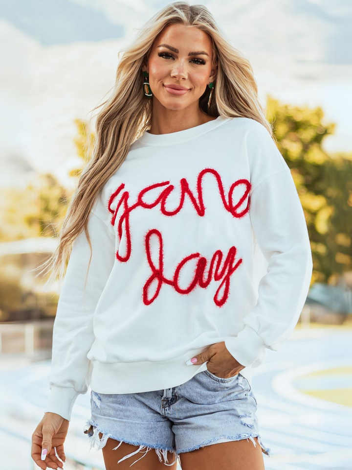 Weißes Tinsel Game Day-Sweatshirt mit überschnittener Schulter und Grafik