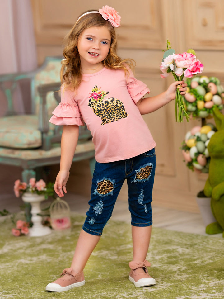 Girls Easter-themed set features a ruffled sleeve top with a leopard print bunny graphic and patched denim capris with a leopard print sash belt for 2T to 10Y toddlers and girls