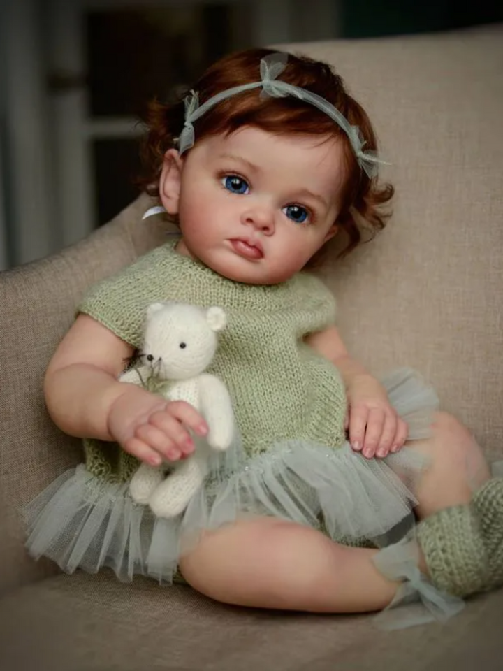 24" Sweet Pea Lifelike  Baby Doll in Green Knit Dress