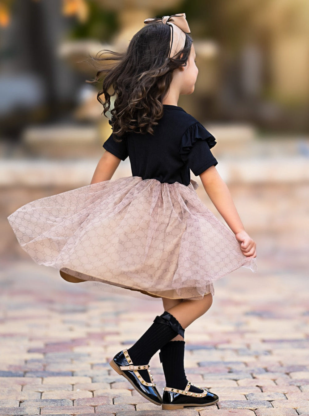 Playful Tulle Skirt Dress with Delicate Pattern and Bow Accent