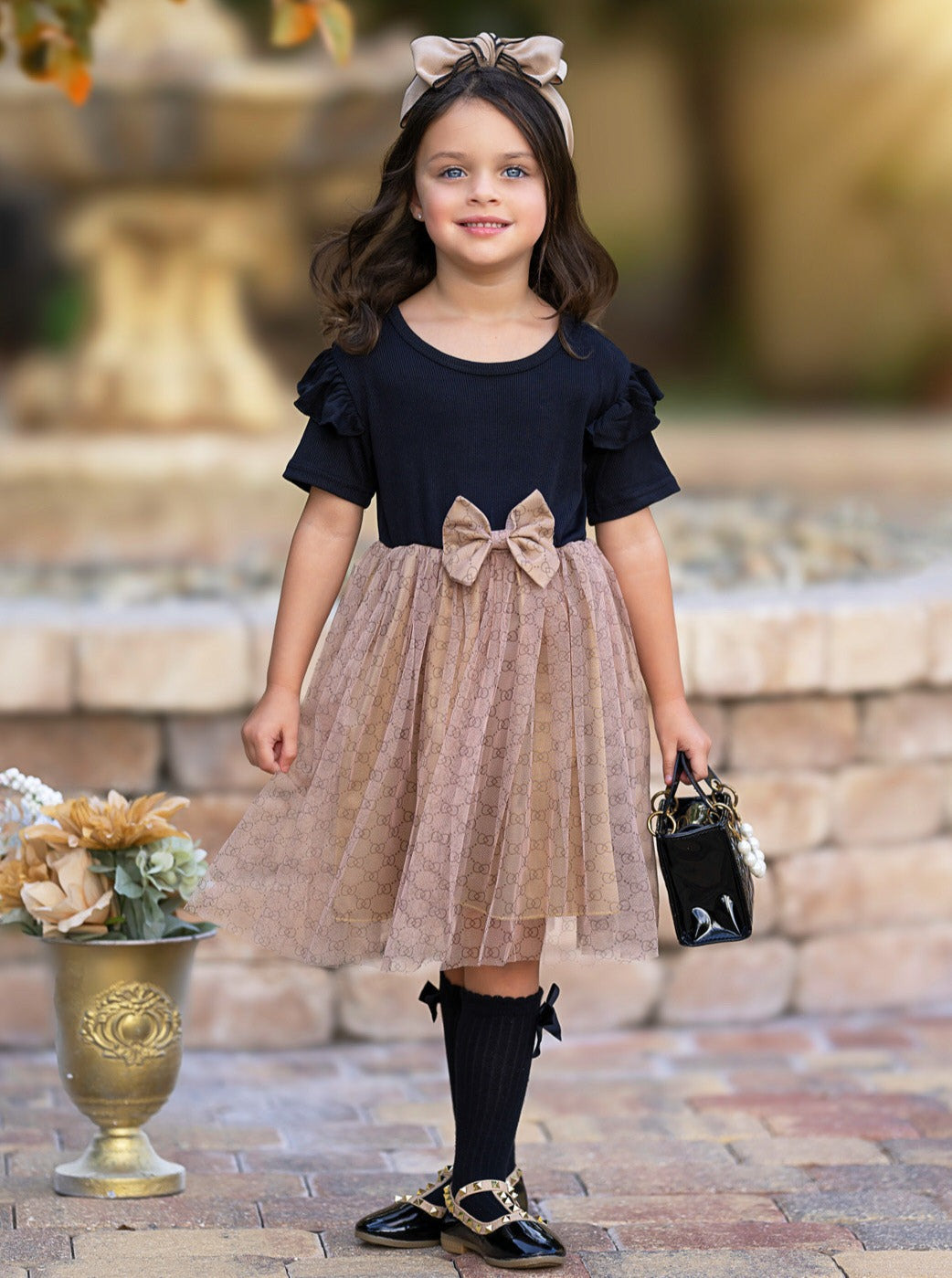 Playful Tulle Skirt Dress with Delicate Pattern and Bow Accent