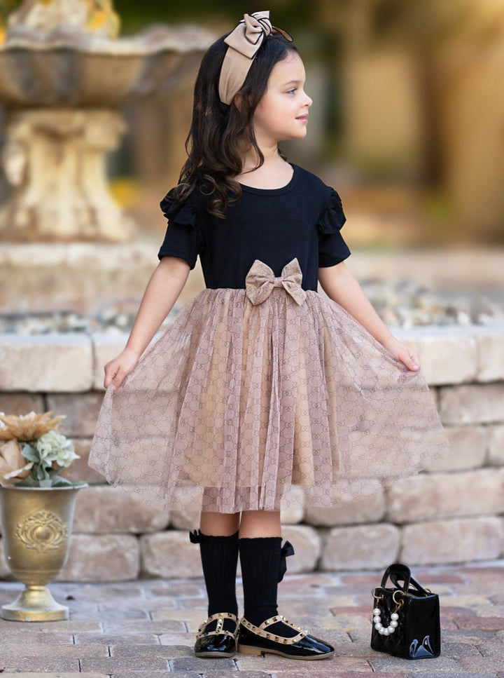 Playful Tulle Skirt Dress with Delicate Pattern and Bow Accent