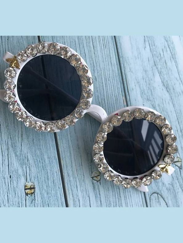 Runde Sonnenbrille mit Glitzersteinen für Mädchen