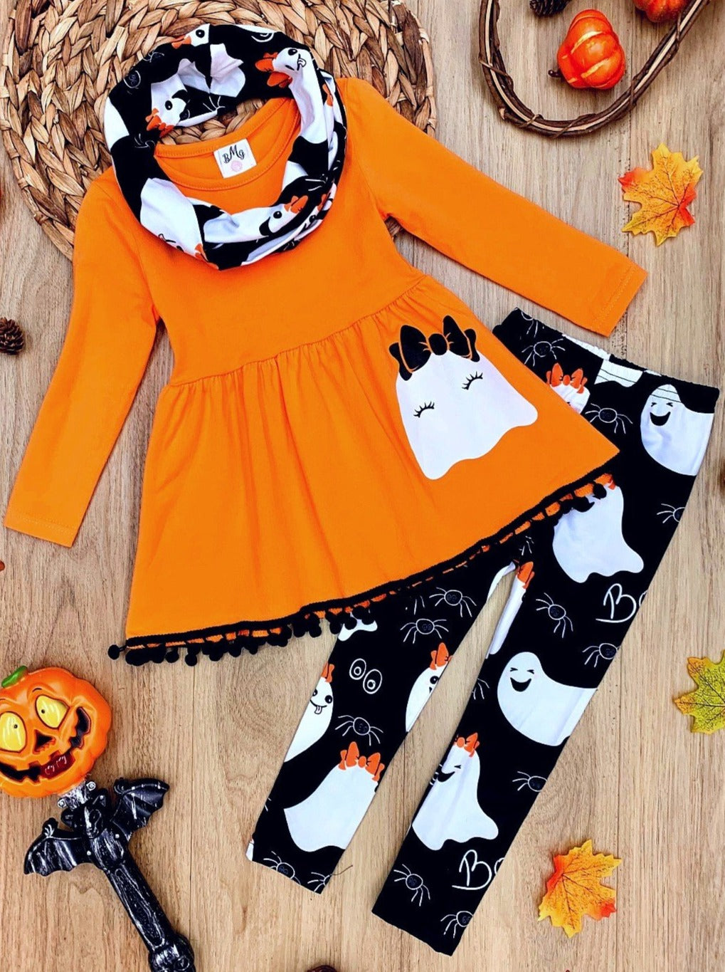 Little girls Halloween long-sleeve tunic with ghost graphic on the skirt, pom-pom, ghost print leggings, and matching infinity wrap scarf - Mia Belle Girls