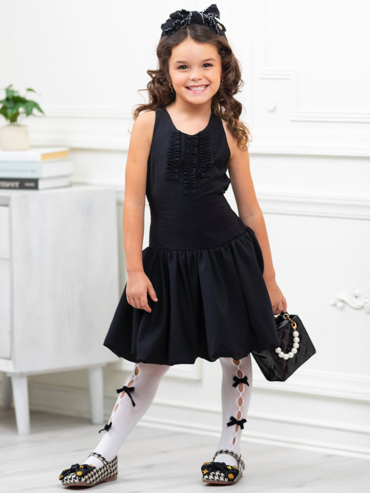 Schickes schwarzes Uniformkleid mit Rüschen von Kids Couture