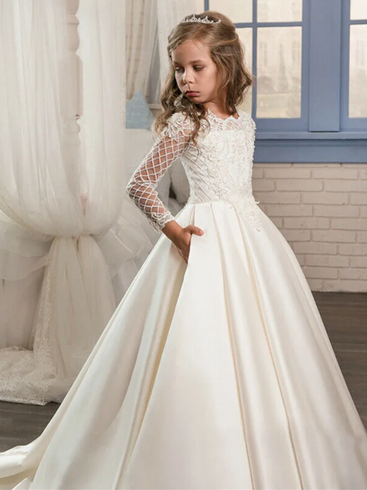 Mia Belle Girls Communion Dresses | White Lace Sleeve Pleated Gown