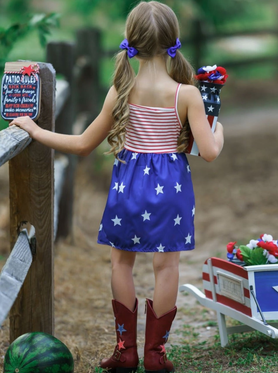 Girls 4th of July dress features a sleeveless red/white striped bodice with crochet details and blue/white star print skirt 2T-10Y for toddlers and girls