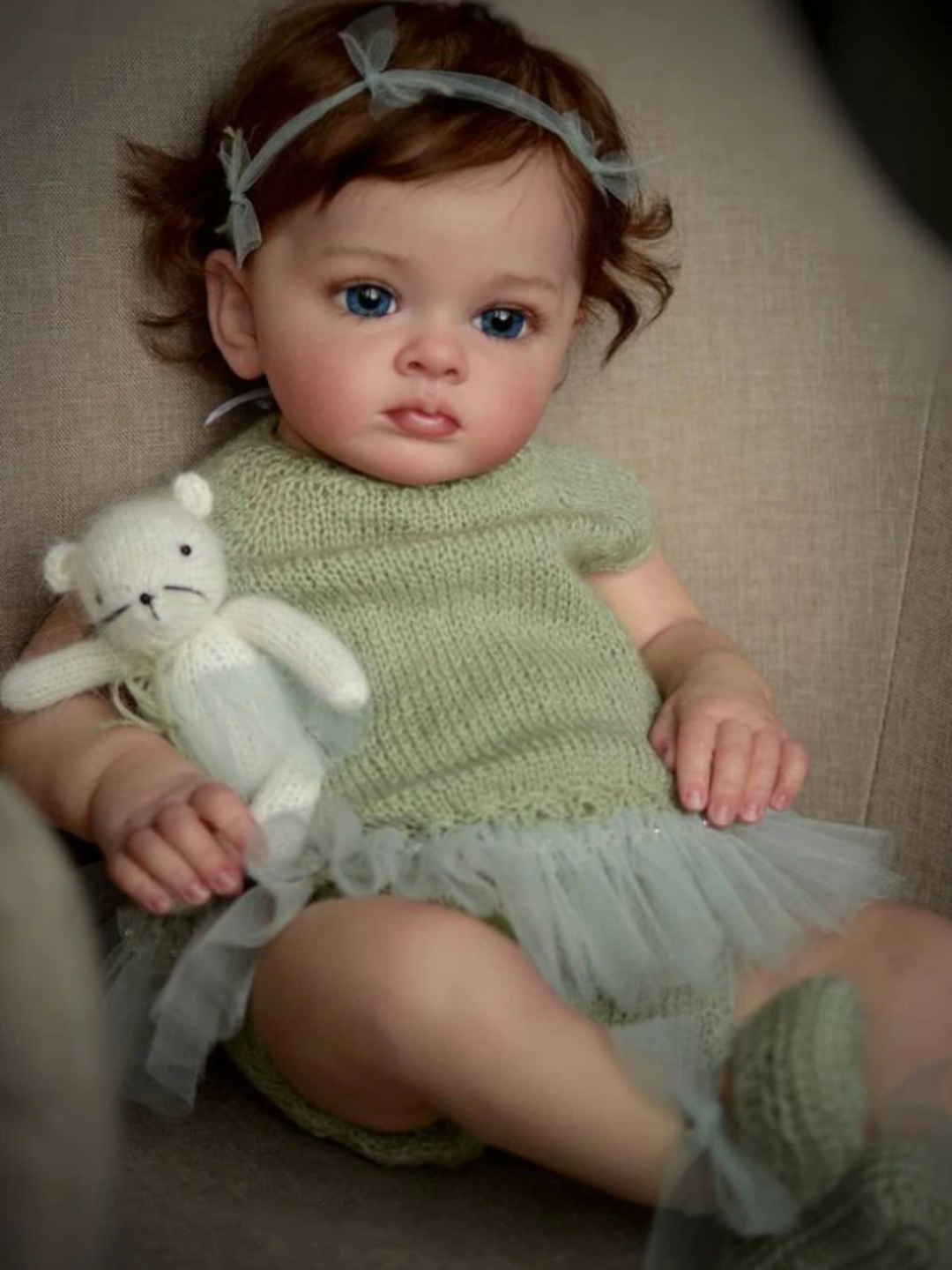 24" Sweet Pea Lifelike  Baby Doll in Green Knit Dress