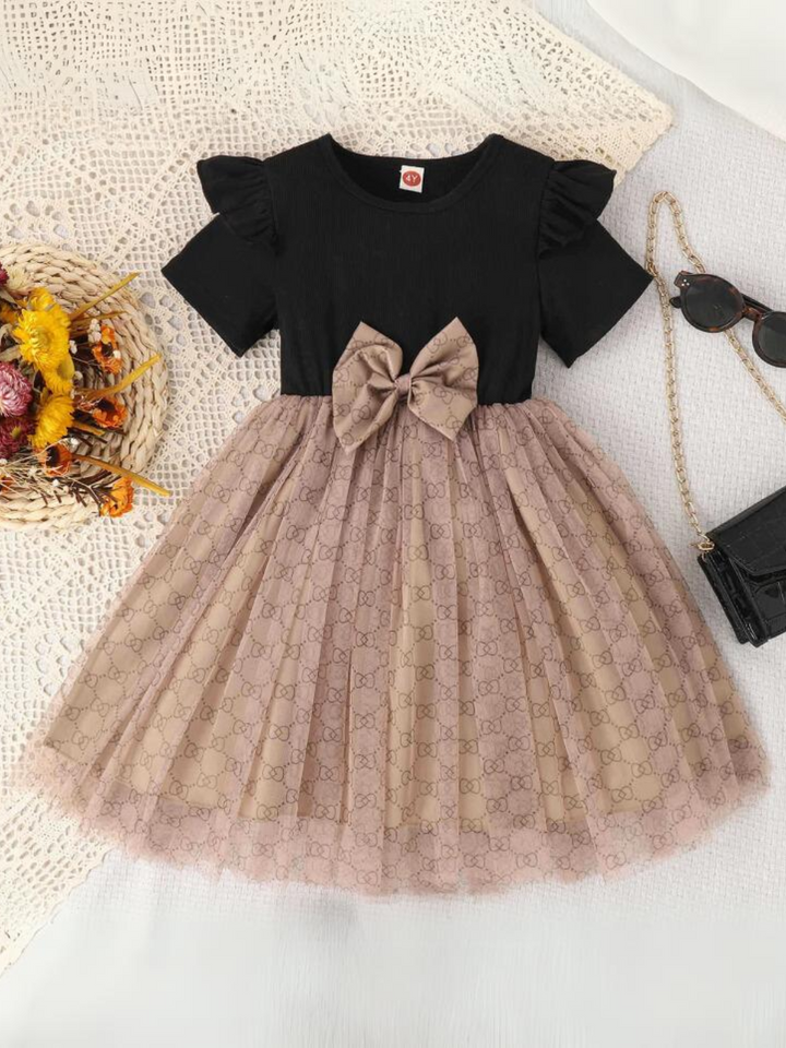 Playful Tulle Skirt Dress with Delicate Pattern and Bow Accent