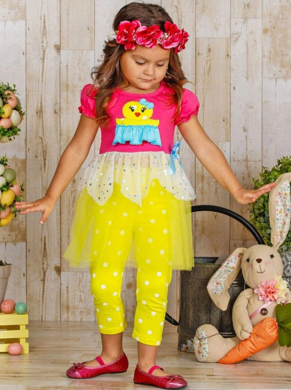 Girls Spring Easter-themed set features ruffle sleeves, chick applique, and two-tier sequin tulle hem with stretchy polka dot capris-length leggings for 2T to 10Y toddlers and girls