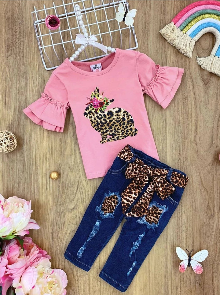 Girls Easter-themed set features a ruffled sleeve top with a leopard print bunny graphic and patched denim capris with a leopard print sash belt for 2T to 10Y toddlers and girls